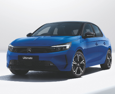 A blue hatchback car with a black roof and alloy wheels, viewed from the front and left side.